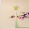 Bordado de mariposa en degradado dorado estilo nacional falda antigua con cara de caballo accesorios colgantes borla de púas hecha a mano joyería al por mayor