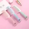 Peine de dibujos animados al por mayor lindo conejo peine para el cabello niña antiestático adulto niños plástico cabello rizado vibración de arriba a abajo