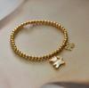 Pulsera de cuentas elásticas de acero de titanio para mujer, elegante, estilo japonés y coreano, con forma de corazón, concha y oso, joyería de moda