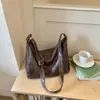 2026 Bolso Nuevo para Mujer Estilo Coreano para el Trabajo Nicho Gran Capacidad Bolso de Hombro Único Moda Femenina Retro Casual Color Sólido Bolso Tote