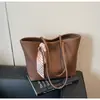 Bolsa Grande Capacidade Transfronteiriça para Mulheres 2026 Novo Estilo Simples Versátil Bolsa de Ombro Retrô Casual Bolsa Tote para Trabalho e Dia a Dia