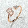 Anillo con Letra de Oro Rosa Nuevo de Amazon Transfronterizo Anillo Abierto con Diamante Blanco Joyería de Mano Anillo Único Personalizado Venta al por Mayor