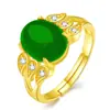 Temperamento anillo de tres hojas con incrustaciones de material de imitación Qinghai jade Hetian huevo anillo de superficie abierto temperamento espinaca verde anillo de calcedonia
