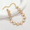 Novo modelo de comércio exterior, sensação de luxo leve e alta qualidade, pulseira de concha de abalone, pulseira de aço inoxidável com concha branca iridescente, requintada e versátil, atacado