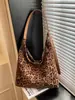 Bolsa de ombro para mamãe e bebê de grande capacidade para exportação, nova moda outono/inverno 2026 estampa de leopardo bolsa de trabalho, bolsa transversal retrô versátil