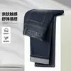 Jeans azules de alta gama de moda 2026 nuevo modelo para hombre de pierna recta versátiles casuales de negocios otoño elásticos pantalones largos