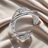 Anillo de Acero de Titanio Transfronterizo Europeo y Americano Moda Acero Inoxidable Apertura Ajustable Anillo de Dedo Geometría de Presión de Aceite Anillo de Viento Versátil para Mujeres