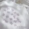 Nova joia de unha com laço de fita de gelo, cores mistas, resina tridimensional, acessórios de broca de unha atacado