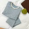 Conjunto de ropa de algodón Clase A para niñas, otoño 2026, pijama infantil 10A antibacteriano y amigable con la piel, ropa de estar de mezcla de lana