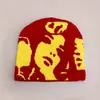Novo chapéu de malha com estampa facial estilo europeu e americano transfronteiriço para homens e mulheres quente nicho personalidade casual chapéu de lã atacado