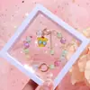 Livro Chapeuzinho Vermelho com Pulseira de Miçangas de Pipoca Sanrio Atacado Cor Desenho Animado Explosões Pulseira Embalada Yiwu Joias