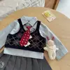 Conjunto Estilo Academia para Niñas 2026 Otoño Chaleco de Punto para Niños Camisa con Corbata Top Falda Plisada Moderno