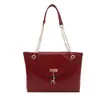 Bolsa Pequeña Cuadrada de Mano con Textura de Gama Alta al por Mayor para Mujer 2025 Otoño Nueva Moda Bolso de Hombro de Lujo Ligero Bolso de Cadena para la Axila