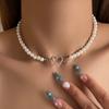 Europa y Estados Unidos joyería caliente transfronteriza temperamento perla cadena clavícula simple hueco amor colgante collar traje multicapa mujeres
