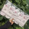 Meias Casuais Femininas Longyixiang de Cano Médio Brancas Fofas Versáteis de Algodão Branco Estilo College 26 Novo Modelo Outono/Inverno