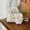 Bolso de Mano Pequeño Sencillo Shuai Mi para Mujer, Bolso Cruzado de Moda Nueva Primavera 2026, Bolso Tipo Almohada Elegante y Moderno