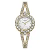 O relógio feminino redondo de quartzo mais vendido da Gedi com pulseira cravejada de diamantes, à prova d'água, estiloso e versátil, relógio de pulso feminino de nicho para o dia a dia.