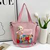 2026 Nueva Bolsa de Hombro de Dibujos Animados Linda Bolso Cruzado para Temporada Escolar Gran Capacidad Bolsa de Maquillaje Bolso de Moda Transfronterizo