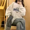 Sudadera de cuello redondo holgada para mujer, nuevo estilo otoño e invierno 2026, con forro polar y engrosada, sin capucha, en blanco y gris, top extremadamente elegante