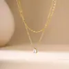 Collar de acero de titanio chapado en oro de lujo ligero y sin decoloración, cadena de clavícula con lazo de moda versátil para mujer, fabricantes
