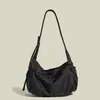 Bolsa Grande para o Dia a Dia Bolsa Casual de Ombro Único 2026 Nova Bolsa Tote de Nylon para Homens e Mulheres Bolsa Transversal Impermeável Estilo Esportivo