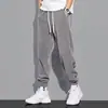 Pantalones de Chándal para Hombre Transfronterizos Sueltos para Hombre Otoño Nuevo Estilo Pantalones Casuales Marca Tendencia Juvenil Versátiles Deportivos Pantalones con Cordón para Hombre