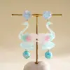 Brincos de cisne em resina com gradiente criativo europeus e americanos, brincos de moda personalizados transfronteiriços, brincos de nicho de alta qualidade para mulheres