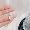 Colección de Collares de Acero de Titanio, Estilo Celebridad de Internet, Cadena para la Cintura Incrustada con Diamantes, Piedra Ojo de Gato, Collar de Flor de Tulipán