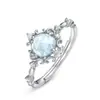 Anillo de Plata de Ley 925 Estilo Japonés y Coreano Lujo Ligero Topacio Azul Cielo Corolla Nuevo Anillo de Flor Vintage Venta al por Mayor
