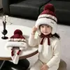 Gorro de invierno para niños con orejeras, gorro de lana tejido para niñas con forro polar y engrosado, diseño lindo de pompón, gorro a prueba de viento y cálido para bebés