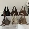 Bolsa de Mão Nova Estilo Coreano de Nicho para Mulheres Primavera 2026, Textura Retrô, Ombro Único Transversal Balde Bolsa de Trabalho