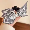 Pinza para el pelo de la parte trasera de la cabeza para mujer, estampado de letras francesas, corazón, estilo de moda, retro, de alta gama, flor de anacardo, lazo, goma para el pelo