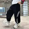 Pantalones para Niños Estilo Primavera y Otoño 2026 Niños Medianos y Grandes Pantalones Casuales Pantalones Deportivos Elegantes Niños Estilo Coreano Pantalones Largos Deportivos de Moda Pierna Ancha