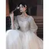 Vestido de novia ligero 2026 nuevo modelo para compromiso y registro, bata de mañana de color liso para fotografía de viaje, cuello en V, mangas cortas abullonadas, largo hasta el suelo, nicho de lujo ligero