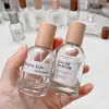 Botella dispensadora de perfume de lujo ligero con tapa de madera de rosca, botella de spray de vidrio, botella vacía de presión, botella de presión de repuesto de muestra de 30 ml