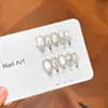 [Luna Fría] Cristal tipo perla ojo de gato 3D diseño de mariposa con circón, exudando un aura fresca y elegante, arte de uñas hecho a mano