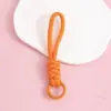 Llavero cordón de cuerda trenzada de nailon para hombres y mujeres hebilla de montañismo cuerda de mano para parejas colgante de bolsa teléfono llave lazo