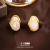 Pendientes Geométricos Irregulares con Borla Estilo Retro Hong Kong Aguja de Plata, Estilo de Nicho, Versátiles para el Trabajo, de Moda y de Alta Gama
