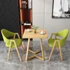 Mesa y sillas de reunión de estilo nórdico, moda italiana, lujo ligero; mesa de recepción y negociación de negocios de alta gama, mesa de ocio para patio