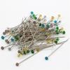 Venta al por mayor de fábrica Nuevo 50 piezas/caja pin de vidrio coloreado DIY joyería corte fijación pin de posicionamiento de vidrio