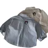 Camisas Infantis Mabao 2026 Outono Novo Estilo Coreano Camisas Masculinas Patchwork com Aplicação Moda Primavera Masculina Atacado