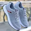 Zapatos de hombre Flyknit, nuevo modelo transfronterizo, cómodos, ligeros, transpirables, zapatos para todas las estaciones, zapatillas de correr para hombre modernas y sencillas, venta al por mayor y dropshipping