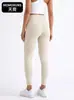 Calça de yoga modeladora de alta elasticidade transfronteiriça para mulheres, leggings esportivos fitness que não enrolam, cintura alta com controle de barriga e levantamento de glúteos, calça tubarão