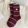 Calcetines lindos de encaje a rayas para mujer, calcetines hasta media pantorrilla, calcetines de algodón de moda, calcetines largos de otoño de estudiante de dibujos animados japoneses de primavera y otoño