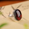 Anillo de plata de ley Yilu S925 con forma de bolsita de loto, ámbar y sangre, con forma de huevo y fideos, estilo étnico, nicho ligero, de lujo, estilo retro.