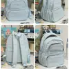 Mochila casual minimalista estilo japonés nueva para niñas, adecuada para compras diarias y ocio, ofreciendo un ambiente fresco y relajado.