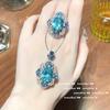 Anillo de gemas de topacio azul con sombra de agua de lago, chapado en oro de 18 quilates, collar con flor de circón del tesoro