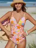 Nuevo traje de baño sexy de una pieza estilo europeo y americano transfronterizo para mujer 2027, adelgazante y que oculta la barriga, con estampados florales, adecuado para vacaciones en la playa y natación.