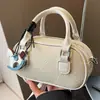 Bolsa Boston de Mão com Textura de Couro Elegante para Mulheres 2025 Novo Estilo Coreano Bolsa Transversal de Nicho Bolsa de Ombro para o Dia a Dia