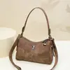 Bolsa de ombro retrô de grande capacidade 2026 novo modelo bolsa de mamãe bolsa transversal estilosa bolsa tote de grande capacidade sob o braço para mulheres